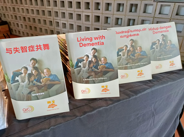 A table full of AIC Flyers on nursing care of dementia patients.